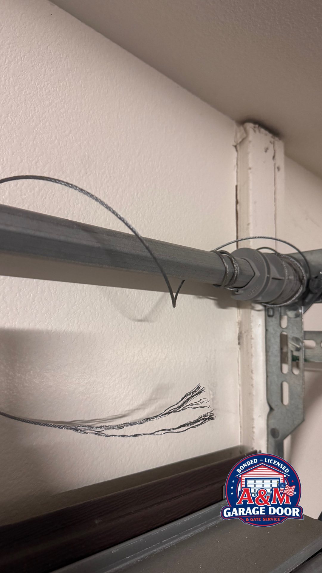 Before: wayne dalton torqmaster spring repair problem on a Sacramento area garage door
