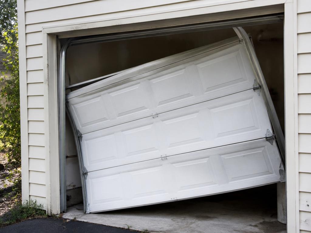 Before: driveway gate install & repair problem on a Sacramento area garage door
